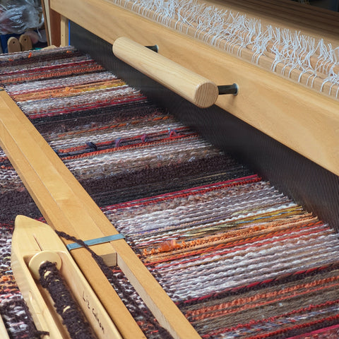 Brown twill rug on the loom